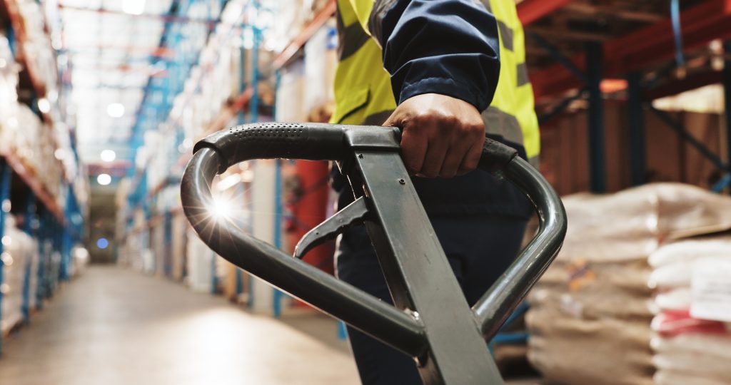 warehouse,,hand,and,worker,pull,pallet,truck,for,supply,chain,